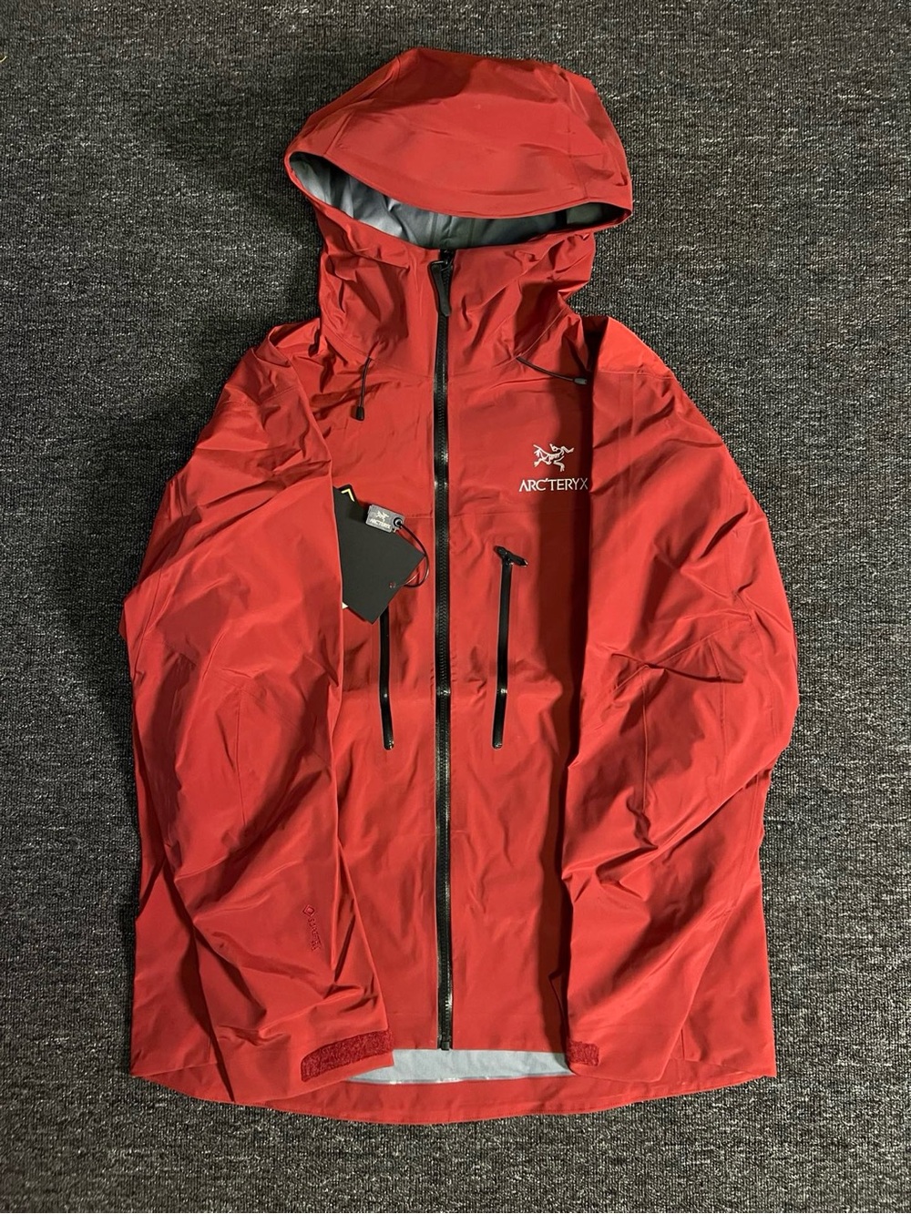 Arc'teryx Red Hooded Rain Shell with White Logo